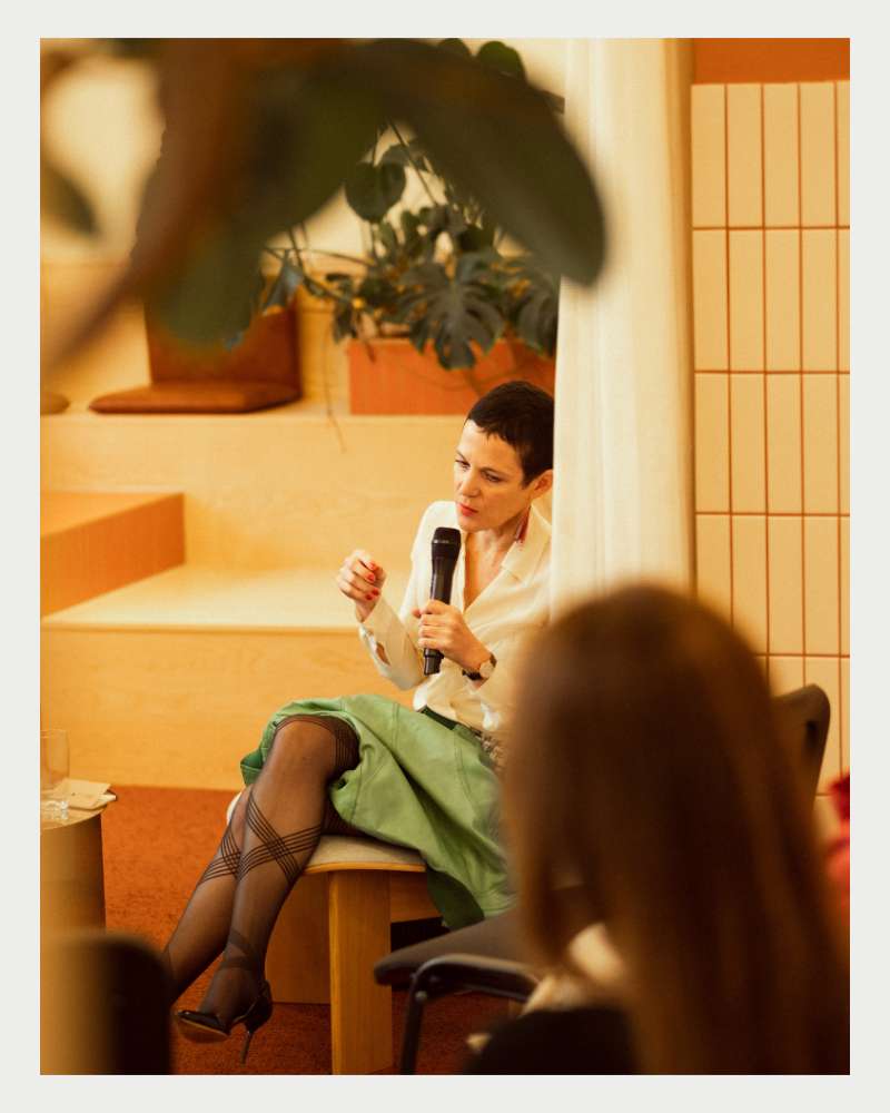 A guest speaking with the microphone