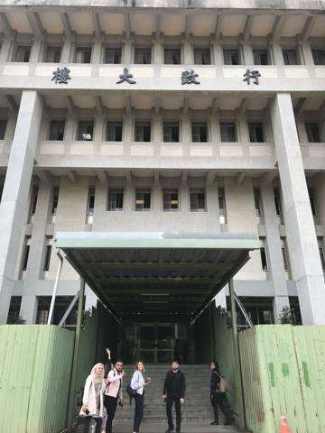 The exchange cohort leaving a campus building in Taipei