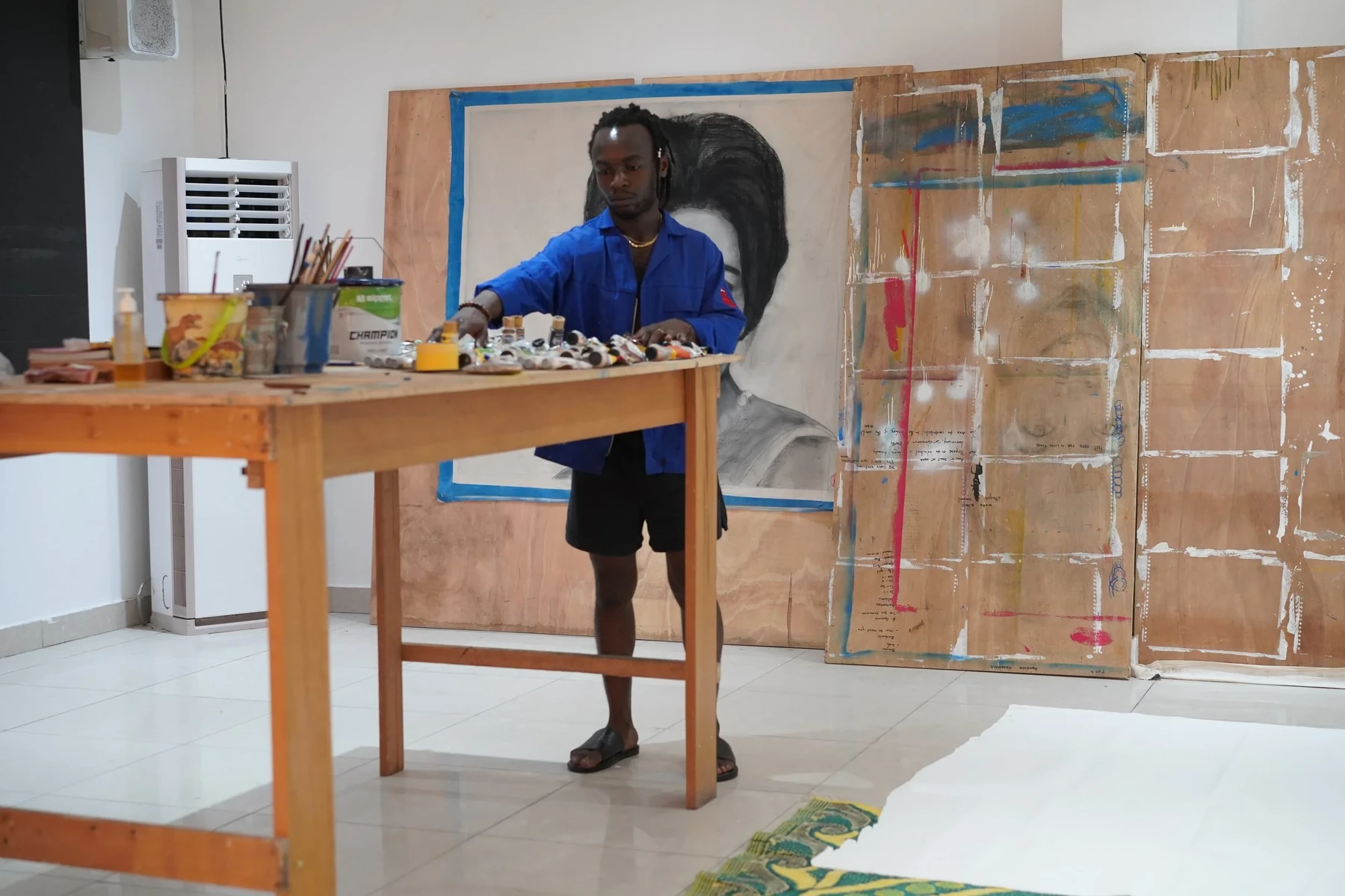 Nana Danso working in his studio in Accra